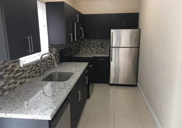 3rd image of 1594 Ne 155Th Ter, North Miami Beach, FL 33162 | MLS# A12031214