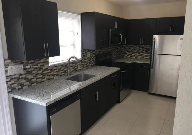 4th image of 1594 Ne 155Th Ter, North Miami Beach, FL 33162 | MLS# A12031214