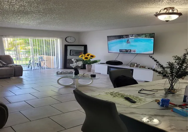 Condo for sale at 18101 NW 68th Avenue #E105, Hialeah, FL 33015 | MLS# A12035146 | Listing updated on 2026-07-06