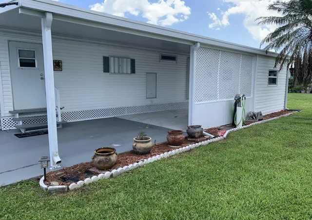 Photo 2 of Manufactured home for sale at 40 Florida Way, Port Saint Lucie, FL 34952 | MLS# B26043263 | Listing updated on 2026-09-23