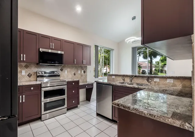 Photo 2 of Single family home for sale at 8754 Nw 75th Place, Tamarac, FL 33321 | MLS# B26043989 | Listing updated on 2026-09-23