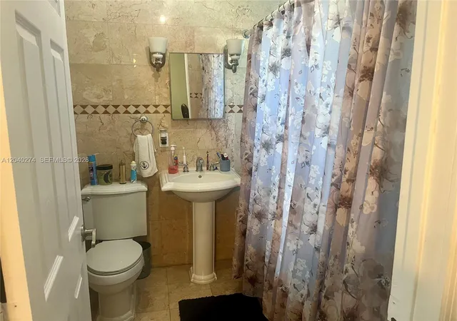 8th image of 521 Nw 32nd Pl, Miami, FL 33125 | MLS# A12040274