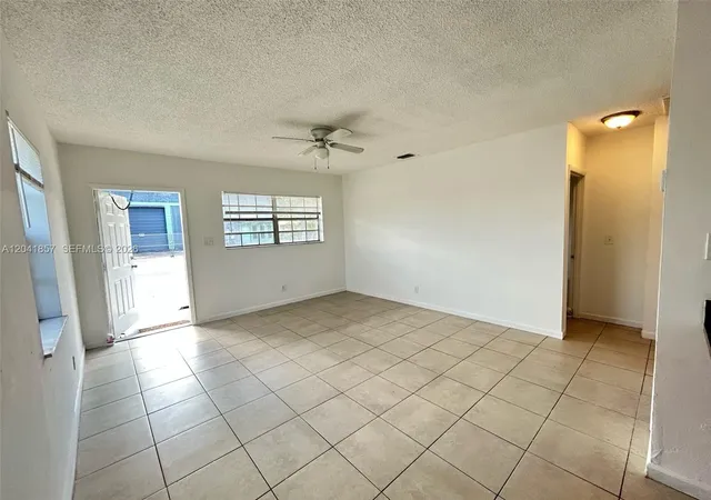 3rd image of 990 Phippen Waiters Rd, Dania, FL 33004 | MLS# A12041857