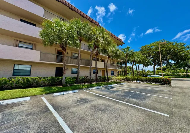 Listing Photo 1 - Condo for sale in building located at 4930 E Sabal Palm Blvd, Tamarac, FL 33319 - Unit #107