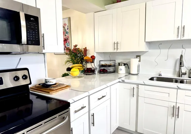 Listing Photo 4 - Condo for sale in building located at 4930 E Sabal Palm Blvd, Tamarac, FL 33319 - Unit #107