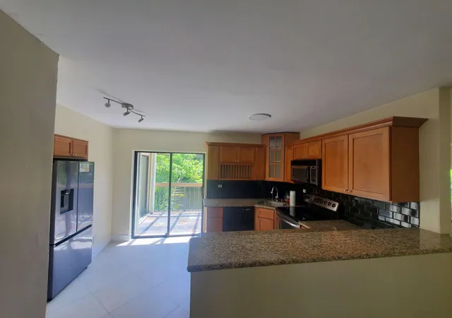Photo 3 of Condo for sale at 12 Wimbledon Lakes Dr #250, Plantation, FL 33324 | MLS# B26045253 | Listing updated on 2026-09-23