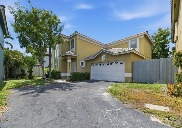 Photo 2 of Single family home for sale at 5477 Nw 44th Way, Coconut Creek, FL 33073 | MLS# B26047067 | Listing updated on 2026-10-01