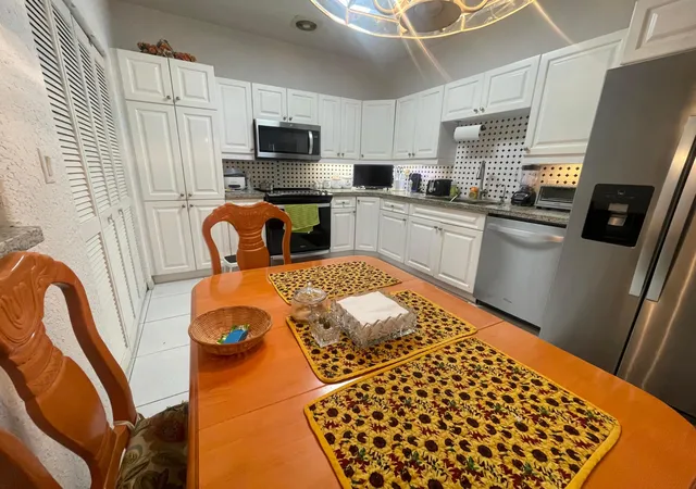 Photo 3 of House for sale at 9858 Royal Palm Blvd #3-14, Coral Springs, FL 33065 | MLS# B26048168 | Listing updated on 2026-09-28