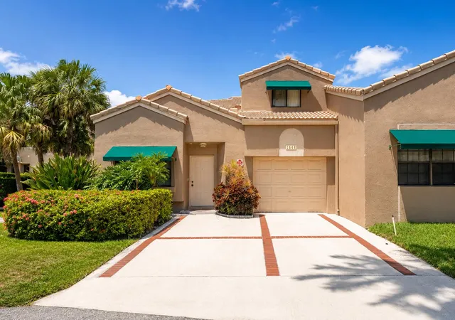 Photo 1 of Townhouse for sale at 1644 Cypress Pointe Dr #1-9, Coral Springs, FL 33071 | MLS# B26048206 | Listing updated on 2026-09-23
