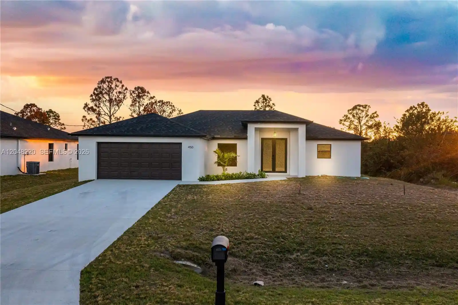 Photo 1 of Single family home for sale at 450 Mercedes Ct, Lehigh Acres, FL 33972 | MLS# A12048220 | Listing updated on 2026-10-28