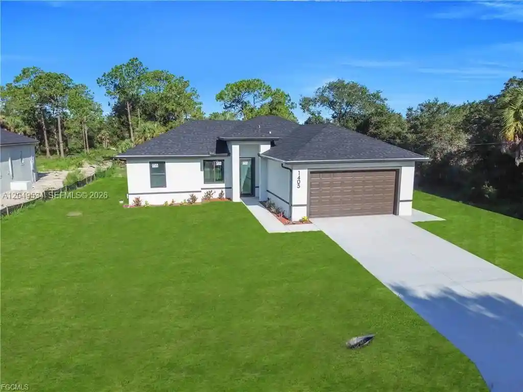 Photo 1 of Single family home for sale at 1405 Palmetto Ave, Lehigh Acres, FL 33972 | MLS# A12049534 | Listing updated on 2026-10-11