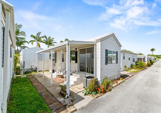 Photo 2 of Manufactured home for sale at 12 Hibiscus Dr #H, Briny Breezes, FL 33435 | MLS# B26049671 | Listing updated on 2026-10-08