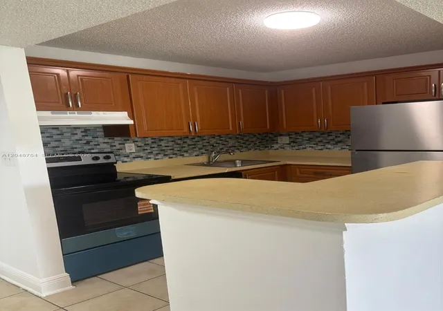 2nd image of 7110 Nw 179th St #211, Hialeah, FL 33015 | MLS# A12048754