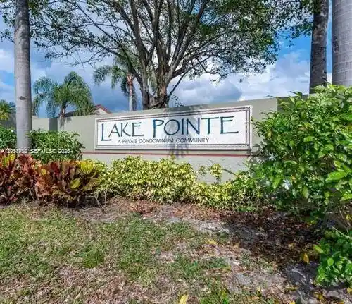 Listing Photo 1 - Condo for sale in 212 Lake Pointe Dr located at 212 Lake Pointe Dr, Oakland Park, FL 33309 - Unit #112