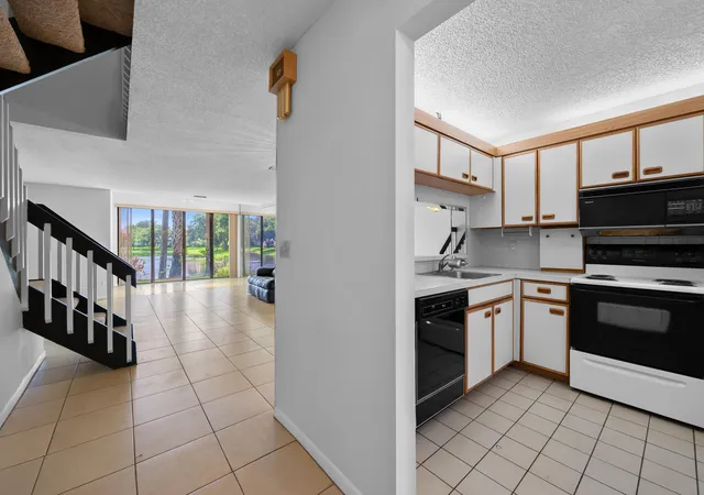 Photo 3 of Townhouse for sale at 4586 Carambola Cir S #27217, Coconut Creek, FL 33066 | MLS# B26051782 | Listing updated on 2026-10-09