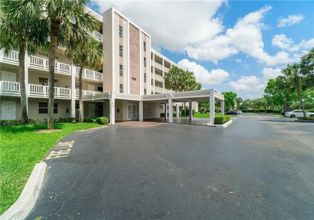 Listing Photo 1 - Condo for sale in building located at 1075 Riverside Dr, Coral Springs, FL 33071 - Unit #508