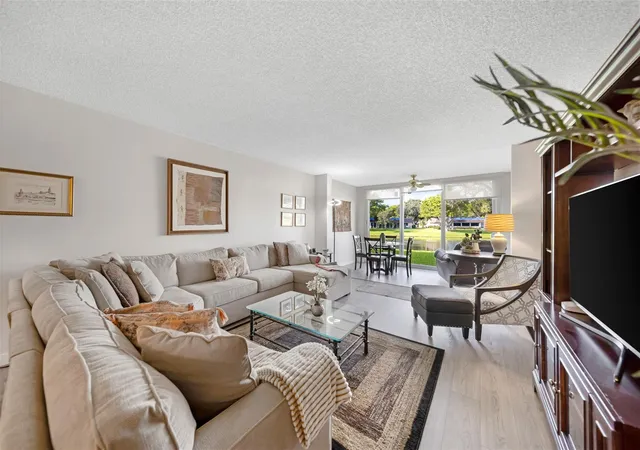 Photo 1 of Condo for sale at 3611 Oaks Clubhouse Dr #104, Pompano Beach, FL 33069 | MLS# B26052290 | Listing updated on 2026-09-23