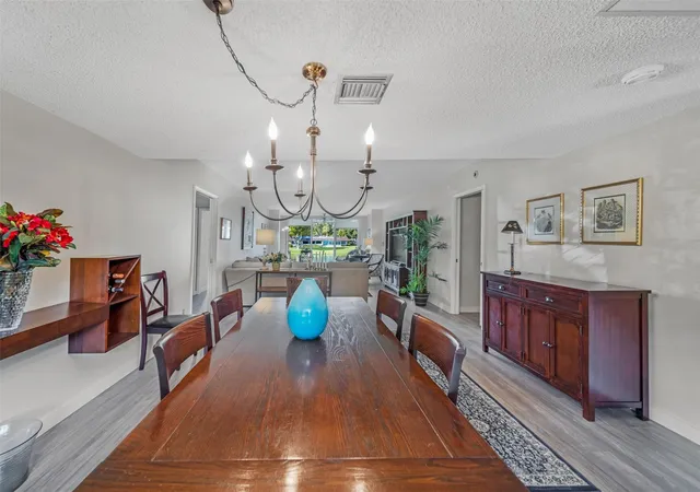 Photo 3 of Condo for sale at 3611 Oaks Clubhouse Dr #104, Pompano Beach, FL 33069 | MLS# B26052290 | Listing updated on 2026-09-23