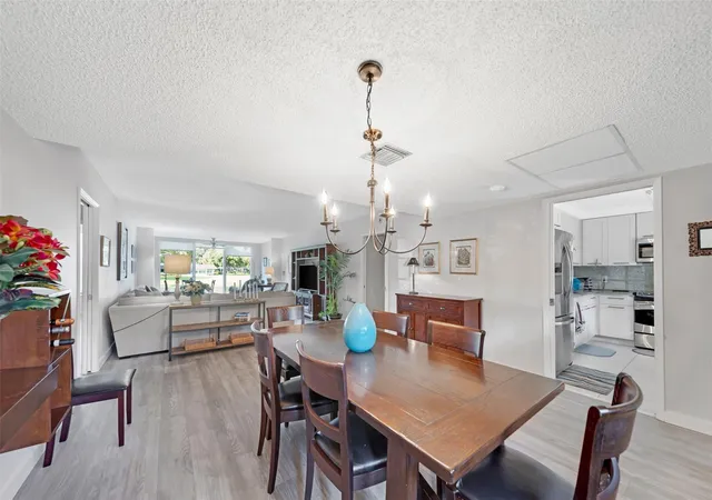 Photo 3 of Condo for sale at 3611 Oaks Clubhouse Dr #104, Pompano Beach, FL 33069 | MLS# B26052290 | Listing updated on 2026-09-23