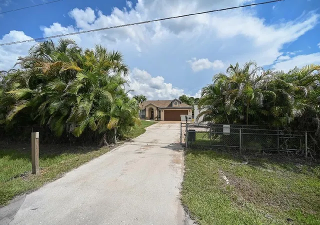 Photo 2 of Single family home for sale at 14918 92nd Court N, West Palm Beach, FL 33412 | MLS# B26052397 | Listing updated on 2026-09-23
