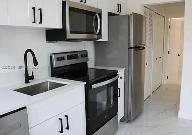 3rd image of 1237 Nw 33Rd Ave, Miami, FL 33125 | MLS# A12053835