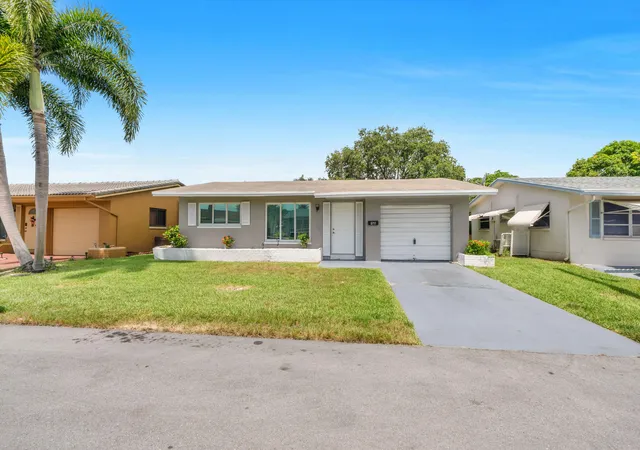 Single family home for sale at 5711 NW 65th Way, Tamarac, FL 33321 | MLS# B26054458