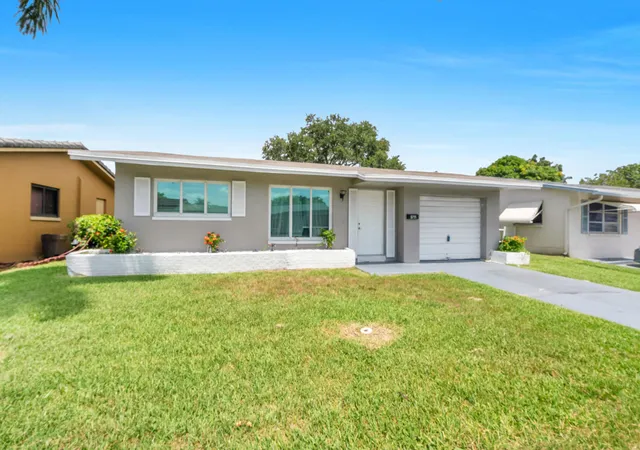 Photo 2 of Single family home for sale at 5711 NW 65th Way, Tamarac, FL 33321 | MLS# B26054458 | Listing updated on 2026-10-08