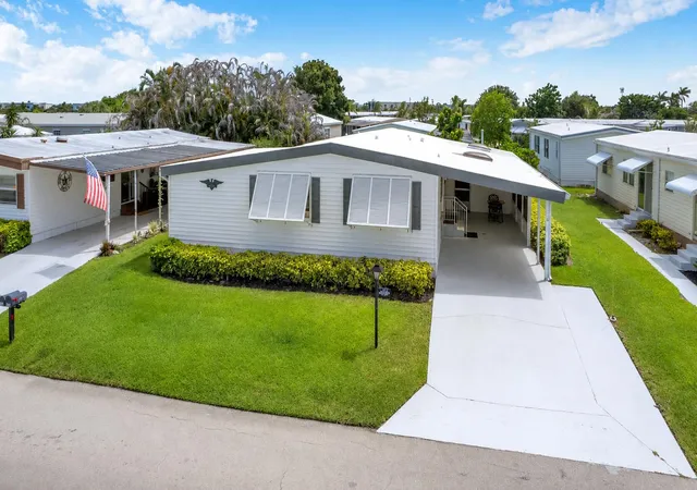 Photo 1 of Manufactured home for sale at 140 Ne Pinelake Village Blvd, Jensen Beach, FL 34957 | MLS# B26055243 | Listing updated on 2026-10-09