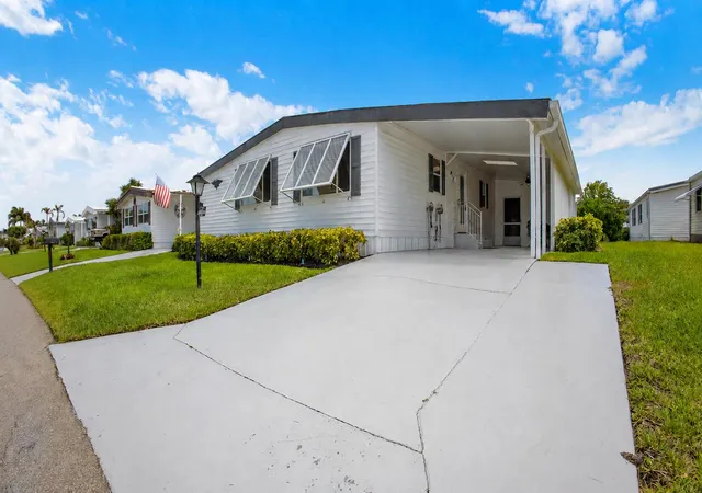 Photo 2 of Manufactured home for sale at 140 Ne Pinelake Village Blvd, Jensen Beach, FL 34957 | MLS# B26055243 | Listing updated on 2026-10-09