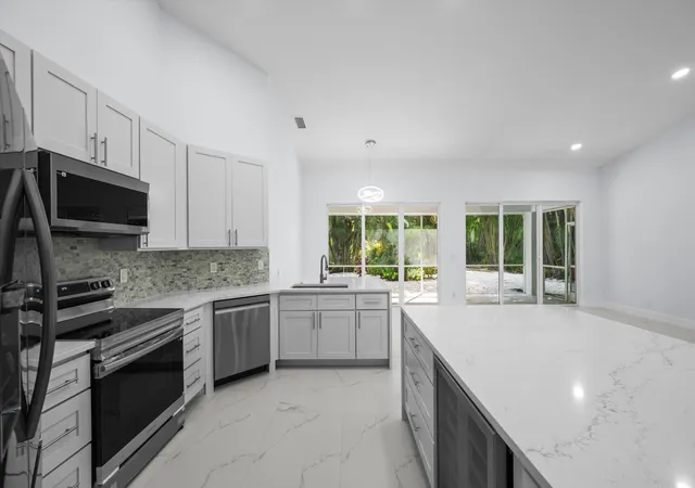 Photo 2 of Single family home for sale at 4521 Carlton Golf Dr, Lake Worth, FL 33449 | MLS# B26055401 | Listing updated on 2026-09-23