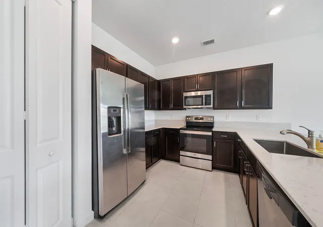 Photo 3 of Townhouse for sale at 2004 Sugar Maple Dr, Riviera Beach, FL 33410 | MLS# B26055533 | Listing updated on 2026-09-23