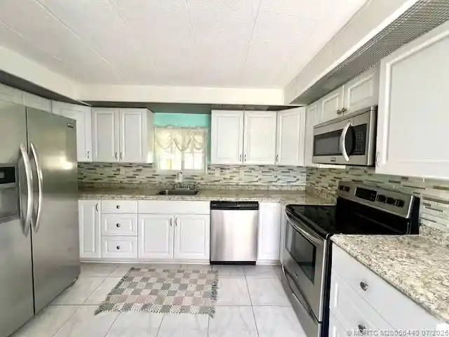 Photo 1 of Manufactured home for sale at 4169 70th Lane N #1047, West Palm Beach, FL 33404 | MLS# M20056440 | Listing updated on 2026-10-27