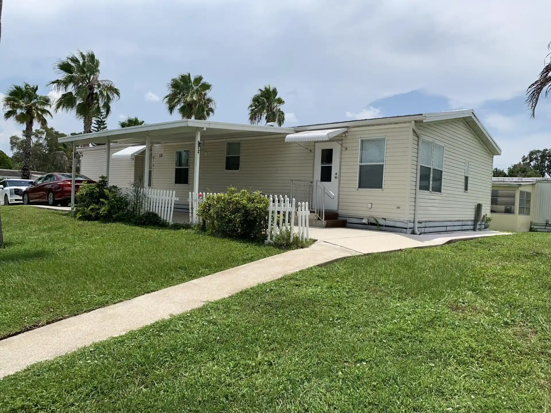 Photo 1 of Manufactured home for sale at 28 Se Flamenco Way, Port Saint Lucie, FL 34952 | MLS# B26057997 | Listing updated on 2026-09-23