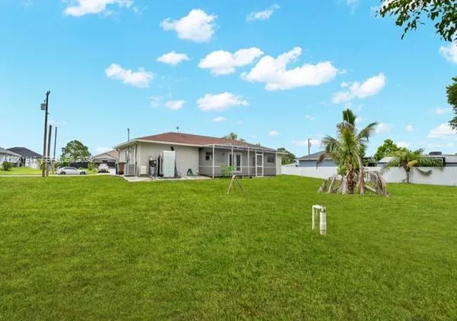 4th image of 909 Sally Ave Ne, Lehigh Acres, FL 33971 | MLS# A12061917