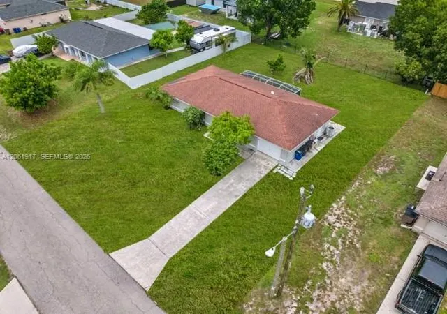 5th image of 909 Sally Ave Ne, Lehigh Acres, FL 33971 | MLS# A12061917