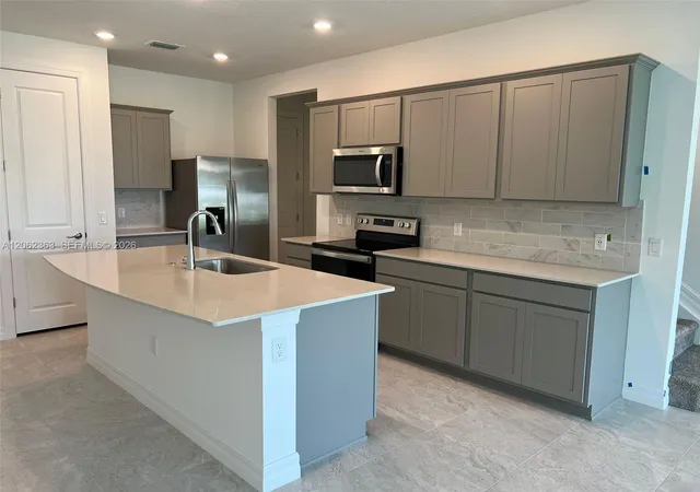 1st image of 6121 Rancho Ln, Greenacres, FL 33415 | MLS# A12062363