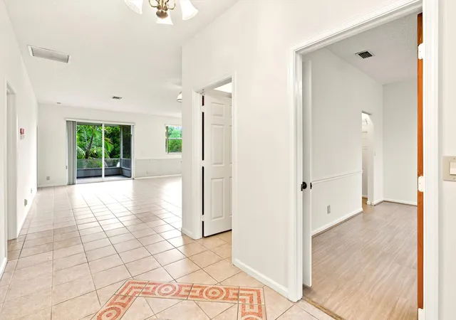 Photo 3 of Single family home for sale at 1490 Fairway Cir, Greenacres, FL 33413 | MLS# B26058279 | Listing updated on 2026-10-08