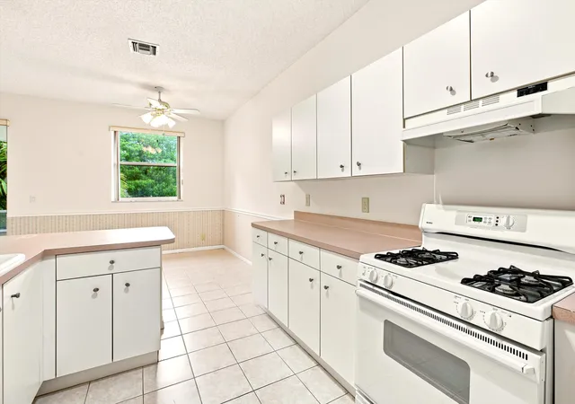 Photo 4 of Single family home for sale at 1490 Fairway Cir, Greenacres, FL 33413 | MLS# B26058279 | Listing updated on 2026-10-08