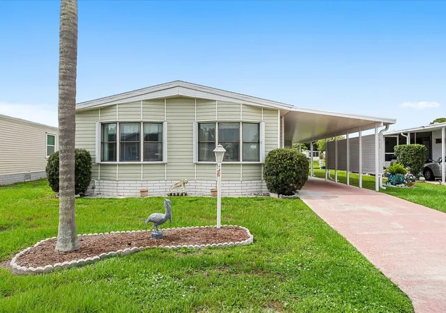 Photo 2 of Manufactured home for sale at 484 Tropical Isles Cir #D-32, Fort Pierce, FL 34982 | MLS# B26058329 | Listing updated on 2026-09-29