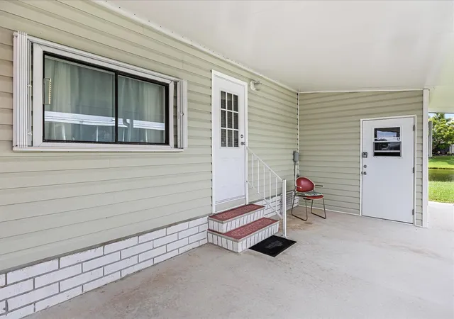 Photo 3 of Manufactured home for sale at 484 Tropical Isles Cir #D-32, Fort Pierce, FL 34982 | MLS# B26058329 | Listing updated on 2026-09-29