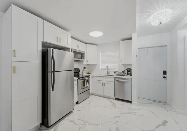 Photo 2 of Townhouse for sale at 809 W Oakland Park Blvd #K2, Wilton Manors, FL 33311 | MLS# B26058541 | Listing updated on 2026-10-09