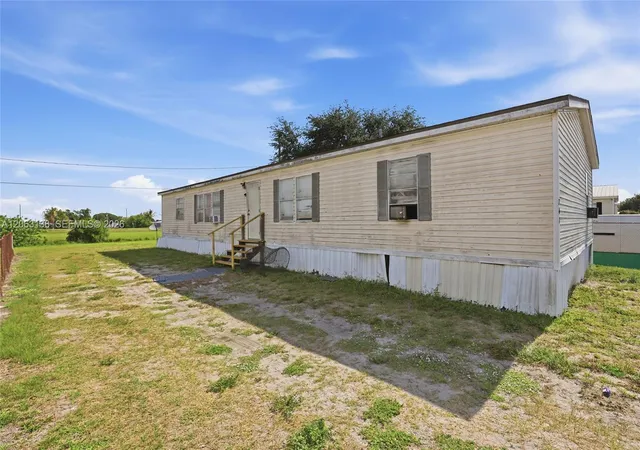 1st image of 741 Alabama Ave, Clewiston, FL 33440 | MLS# A12063138