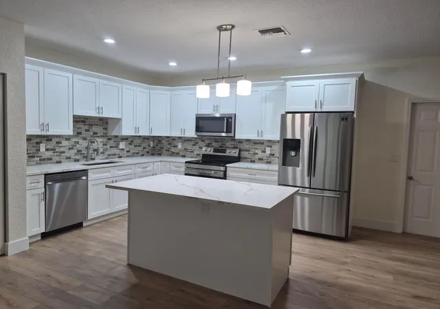 Photo 3 of Townhouse for sale at 6472 Azura Lake Rd, Greenacres, FL 33463 | MLS# B26058718 | Listing updated on 2026-09-23