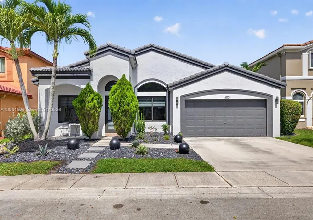 1st image of 1603 E Harmony Lake Cir, Davie, FL 33324 | MLS# A12061598