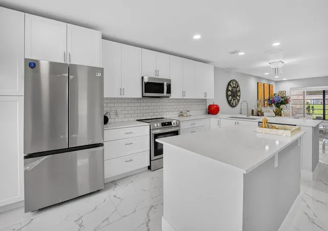 Photo 2 of Single family home for sale at 8967 Belle Aire Dr, Boca Raton, FL 33433 | MLS# B26059596 | Listing updated on 2026-10-09