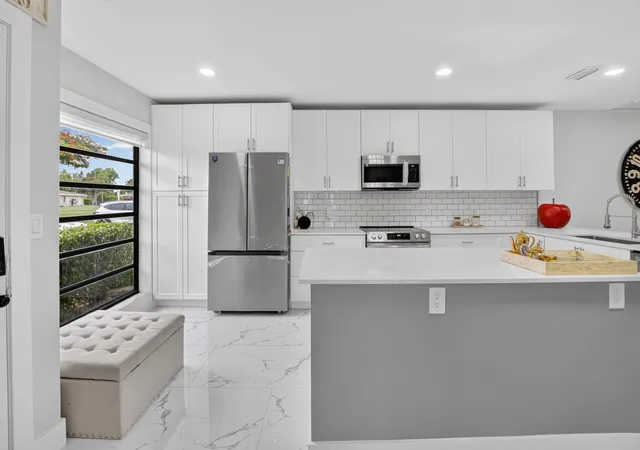 Photo 3 of Single family home for sale at 8967 Belle Aire Dr, Boca Raton, FL 33433 | MLS# B26059596 | Listing updated on 2026-10-09