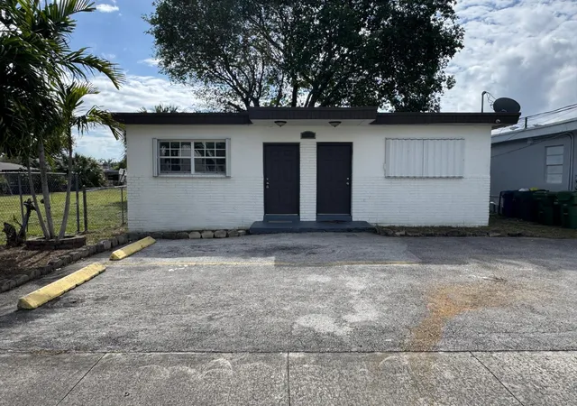 Photo 1 of Multi family home for sale at 1042 Foster Rd, Hallandale Beach, FL 33009 | MLS# B26060855 | Listing updated on 2026-10-09