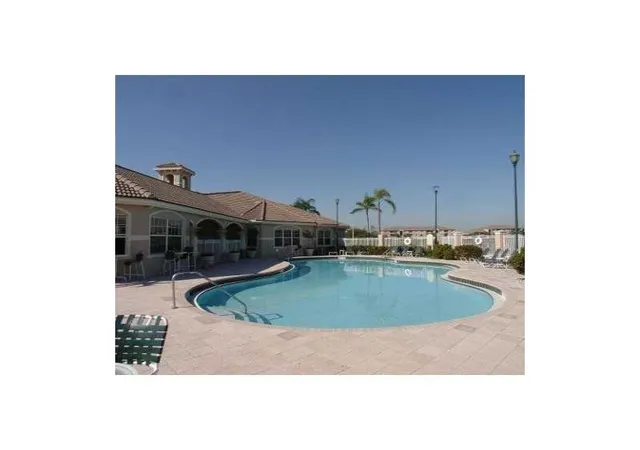 Photo 1 of Condo for sale at 5055 Wiles Rd #201, Coconut Creek, FL 33073 | MLS# B26061398 | Listing updated on 2026-09-28