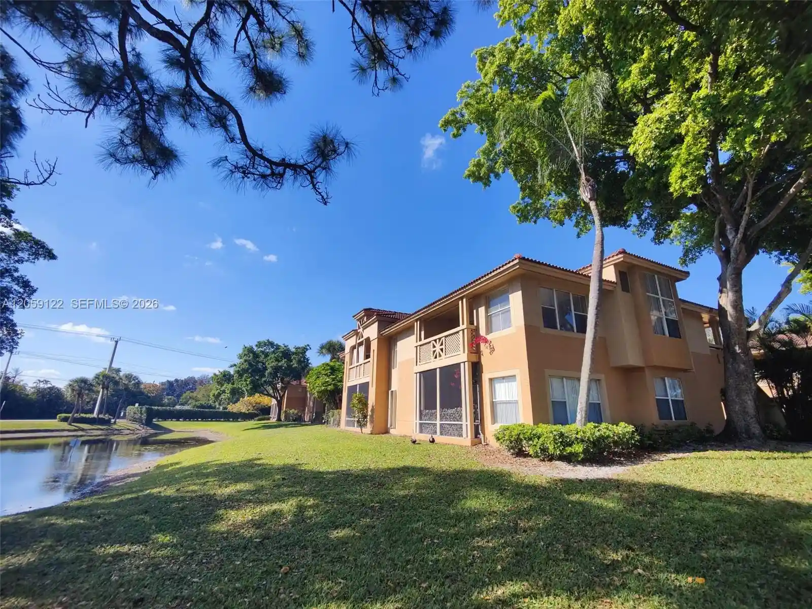 Listing Photo 1 - Condo for sale in 4871 Via Palm Lakes located at 4871 Via Palm Lakes, West Palm Beach, FL 33417 - Unit #701