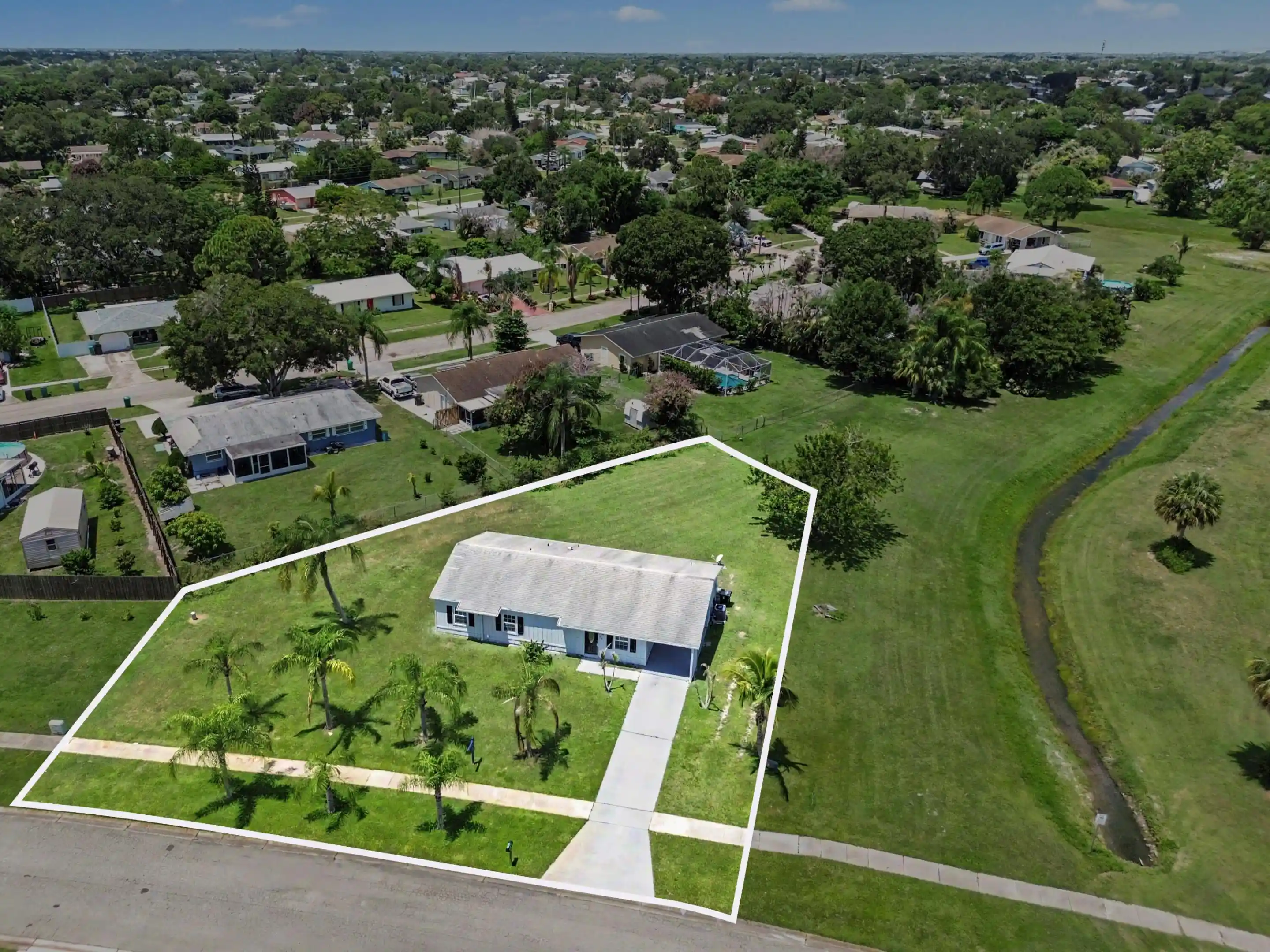 Photo 1 of Single family home for sale at 502 Ne Solida Cir, Port Saint Lucie, FL 34983 | MLS# B26062621 | Listing updated on 2026-10-22